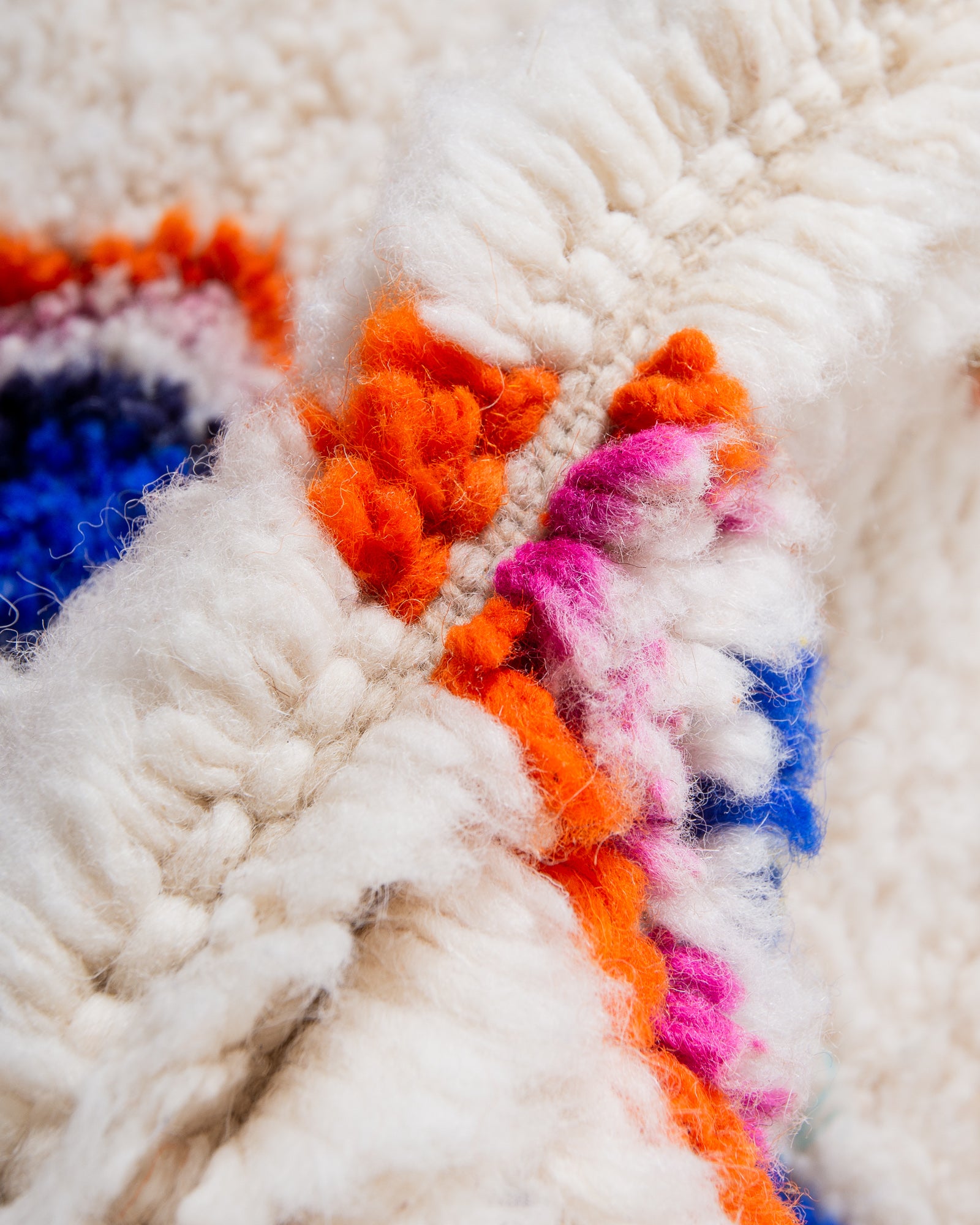 Modern, designer, handcrafted Berber rug from Morocco. Beniourain carpet with beautiful colours and patterns and fluffy wool texture.